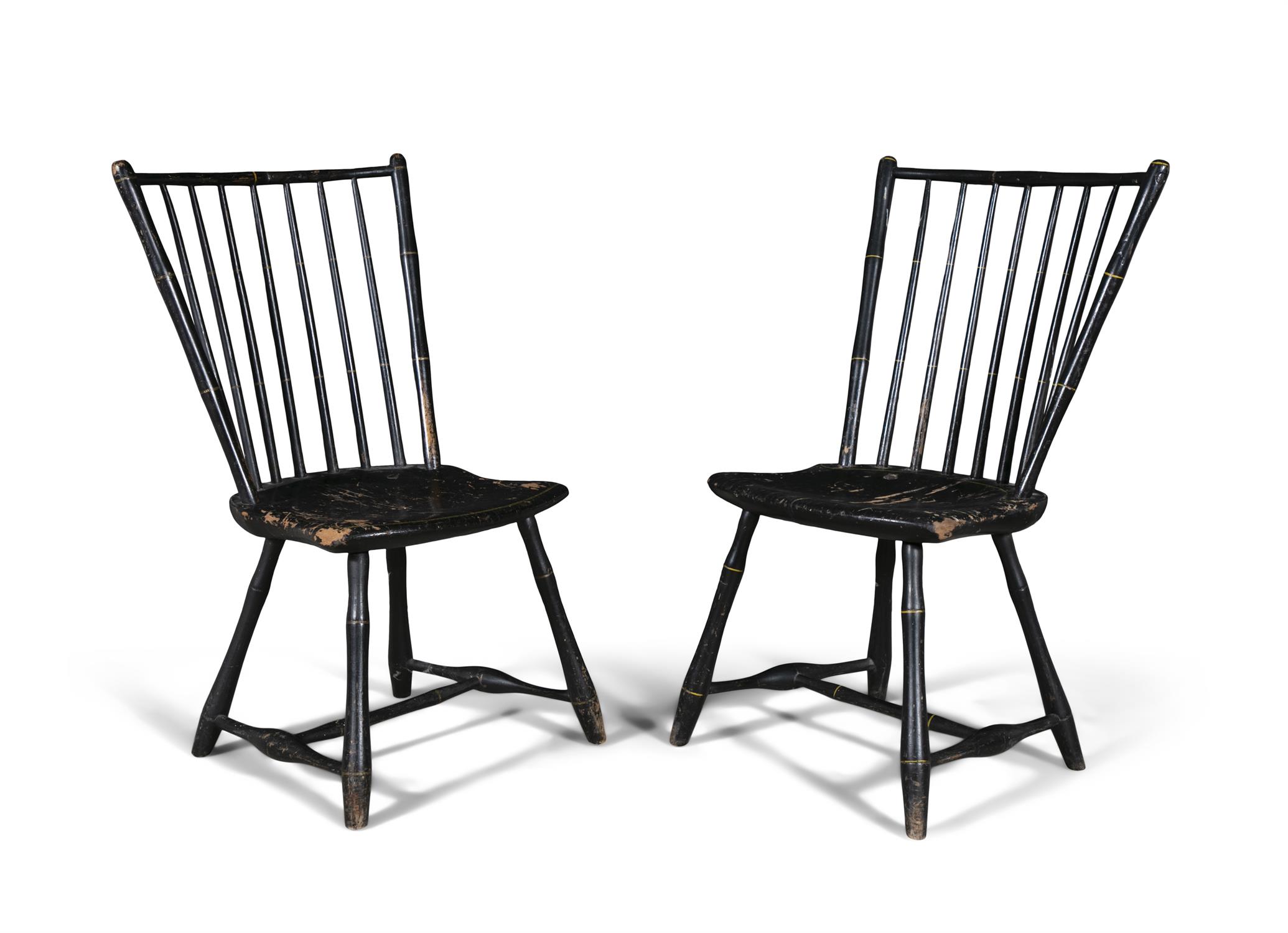 A PAIR OF EBONISED AND GOLD PAINTED WINDSOR CHAIRS, MANNER OF DANIEL CARTERET (W. 1786-1830),