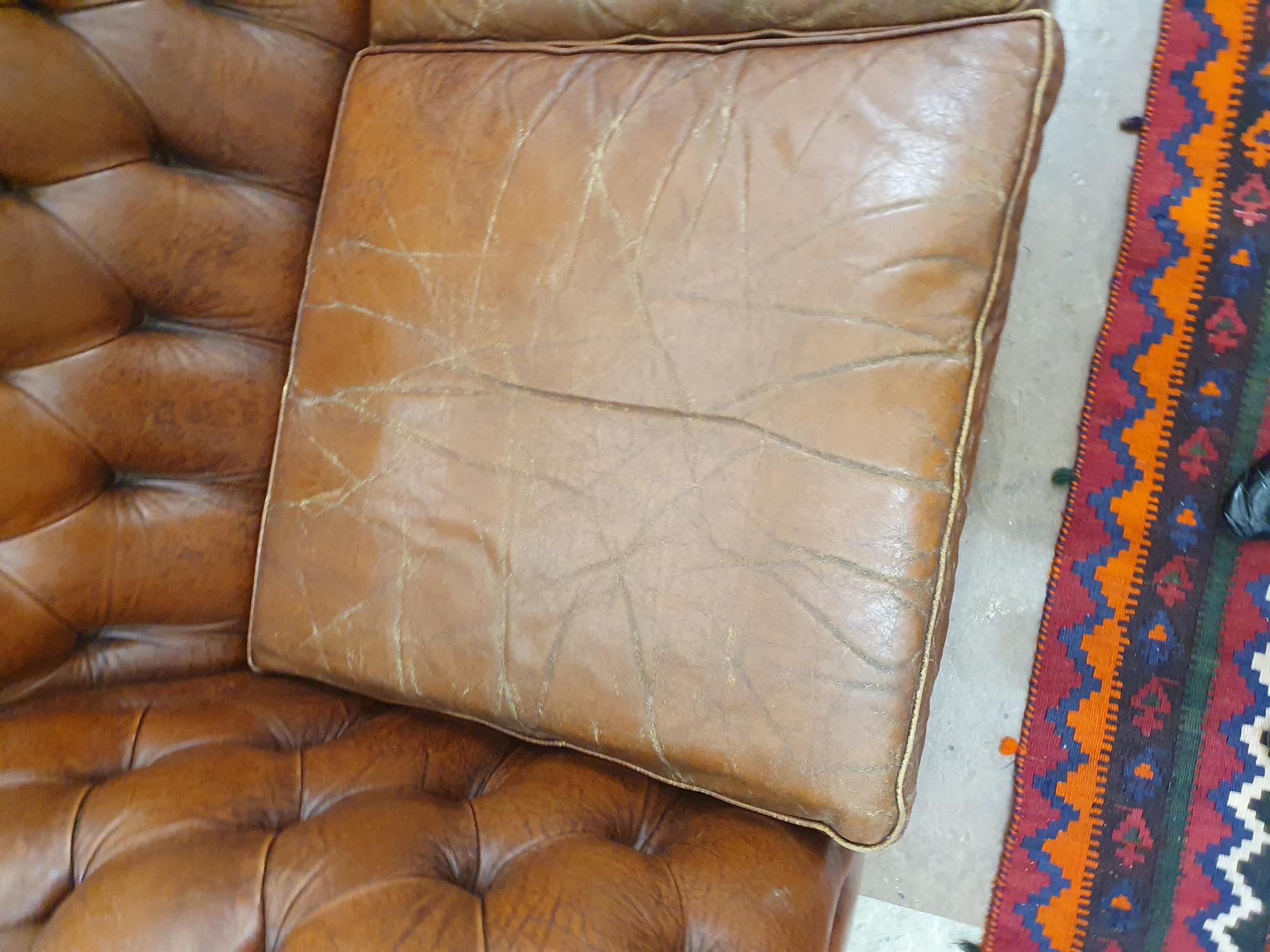 A CHESTERFIELD BUTTON BACK THREE SEATER SOFA, upholstered in brown leather with scroll-end - Image 8 of 18