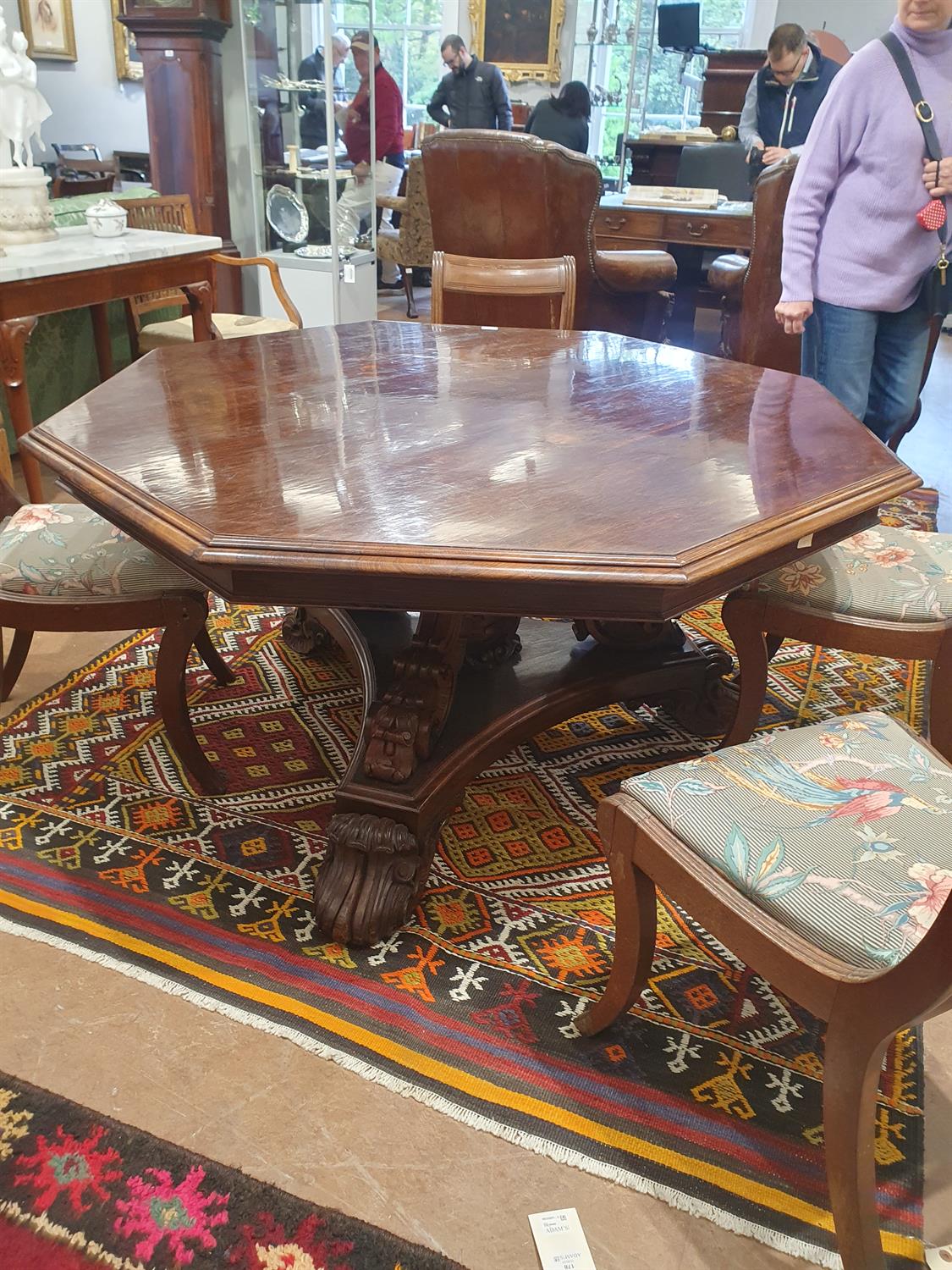 A VICTORIAN ROSEWOOD OCTAGONAL BREAKFAST TABLE, with stepped moulded rim, on carved scroll - Image 13 of 14