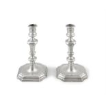 A PAIR OF DUTCH 18TH CENTURY SILVER CANDLESTICKS, The Hague, c.1740, makers mark 'I I' in an