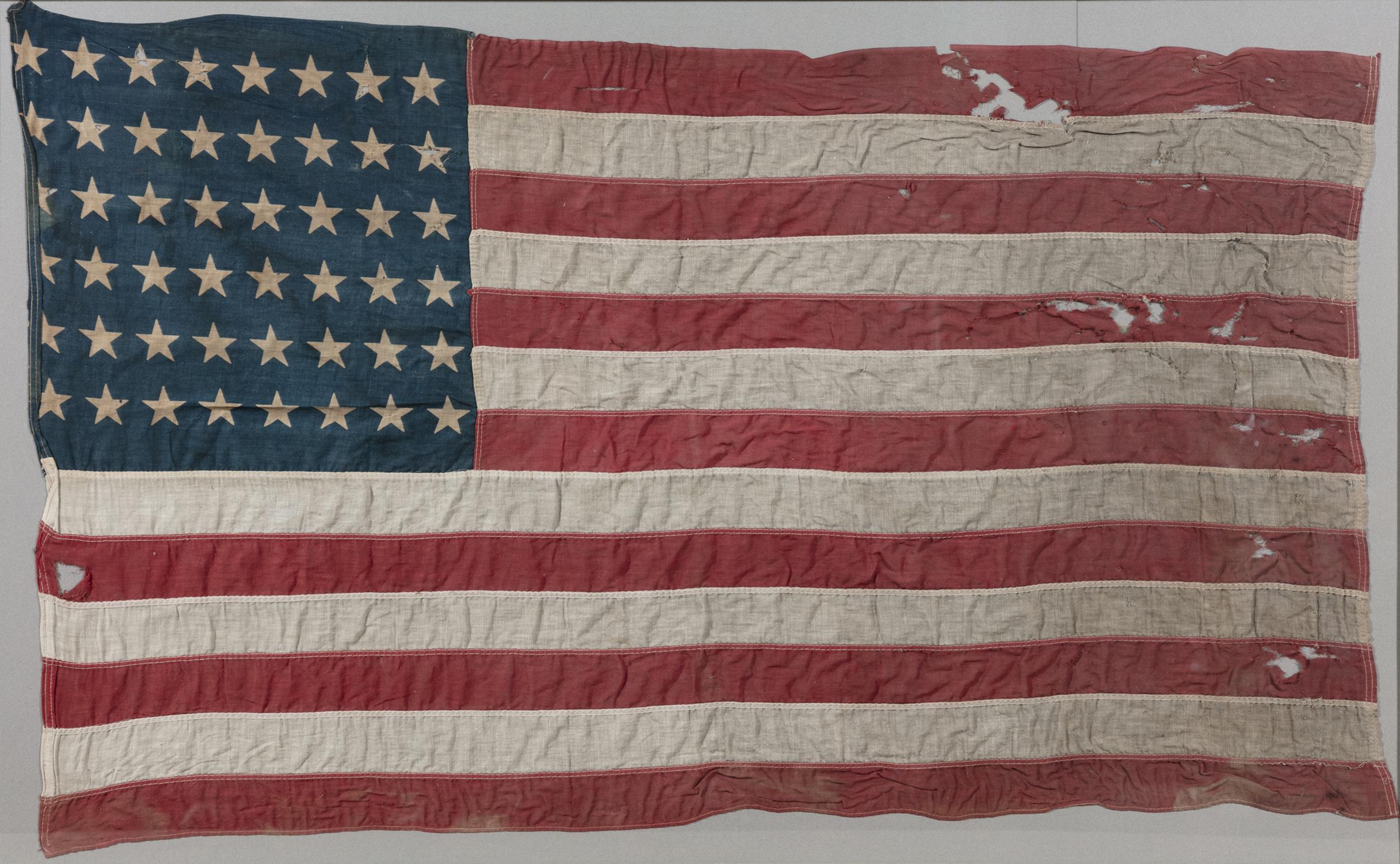 A FOURTY-EIGHT STAR AMERICA FLAG, EARLY 20TH CENTURY dyed linen laid down on board, framed. 68. - Image 2 of 7