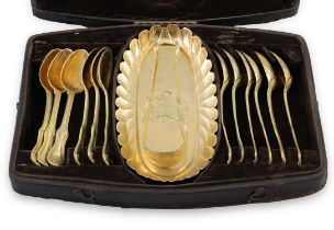 A RARE SILVER GILT SPOON TRAY, London c.1719, Britannia Standard, of elongated oval form,