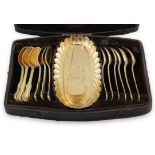 A RARE SILVER GILT SPOON TRAY, London c.1719, Britannia Standard, of elongated oval form,