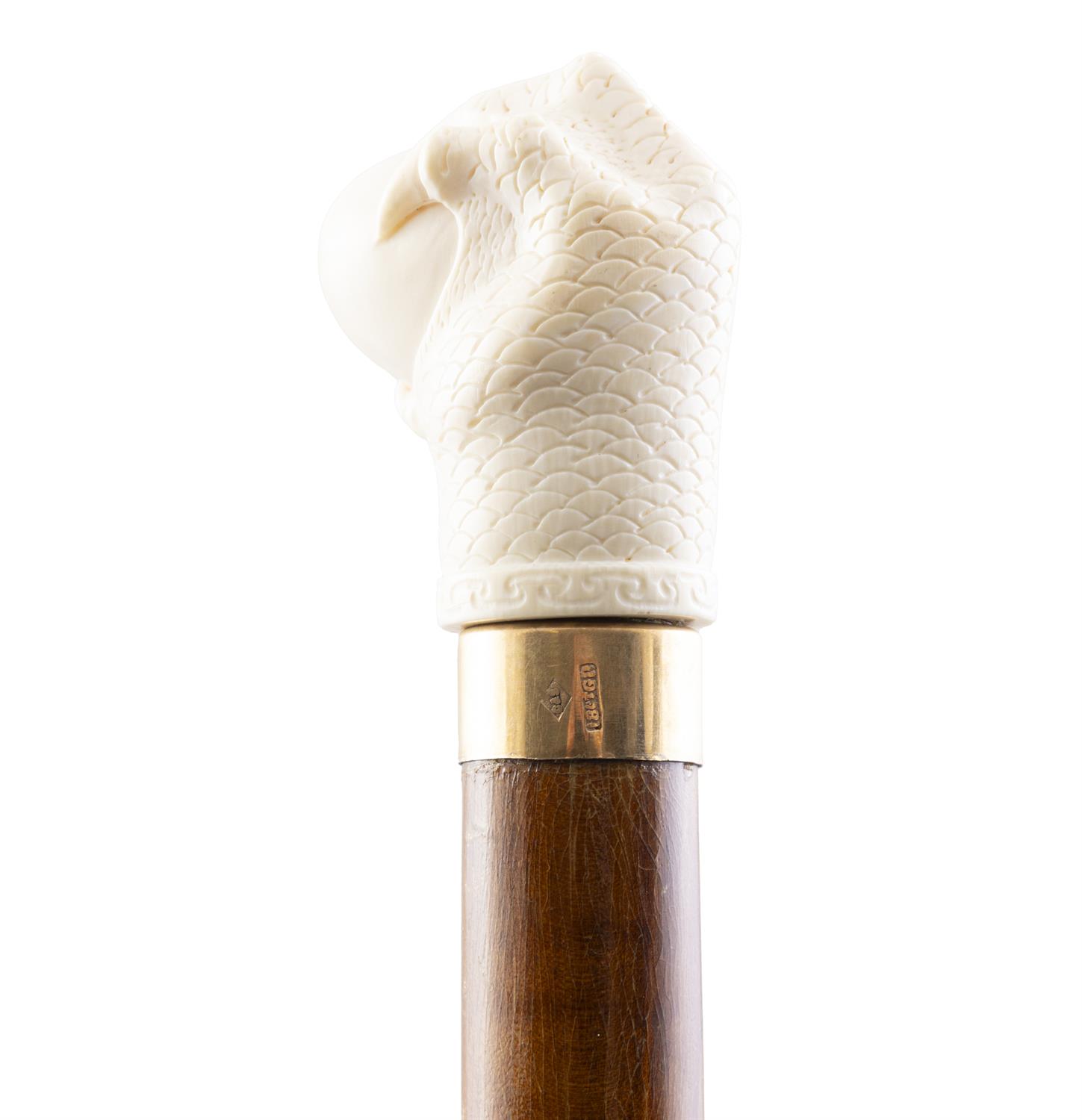 *A WALKING CANE, with carved bone 'fist handle' top in the shape of an eagle's claw grasping an - Image 3 of 3