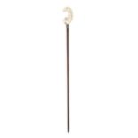 *A WALKING CANE with carved ivory top in the form of moon with the owl perched on its crescent,