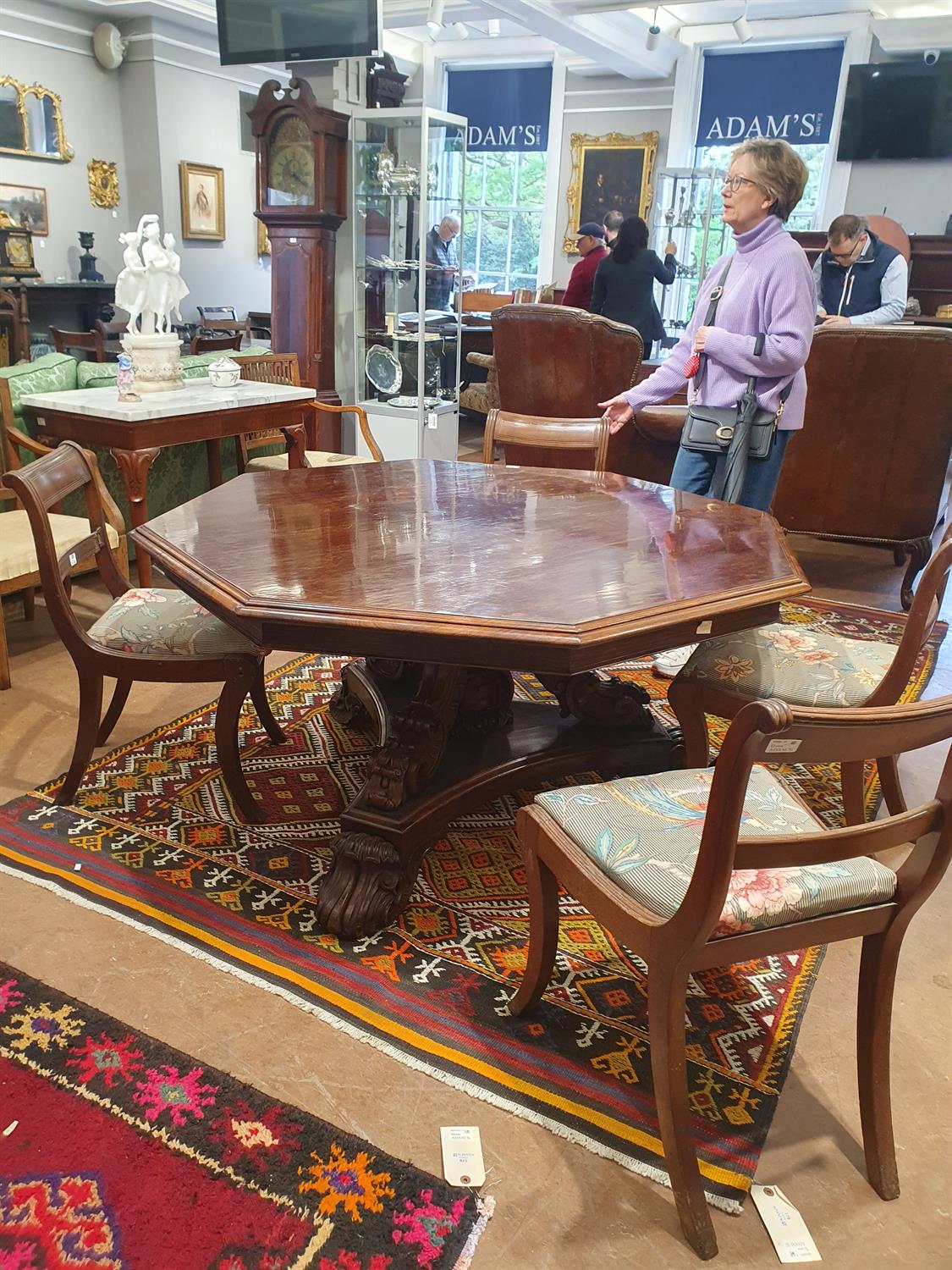 A VICTORIAN ROSEWOOD OCTAGONAL BREAKFAST TABLE, with stepped moulded rim, on carved scroll - Image 12 of 14