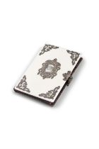 *AN IVORY CARD CASE, with applied metal scrollwork mounts, with crest reserve to centre,