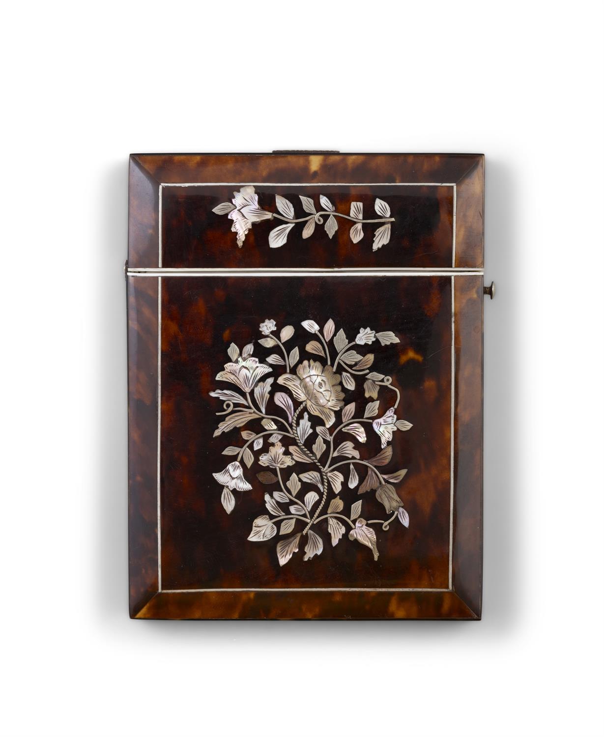 *A TORTOISESHELL AND MOTHER OF PEARL CARD BOX with inlaid mother of pearl floral decoration. 10.