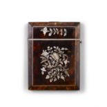 *A TORTOISESHELL AND MOTHER OF PEARL CARD BOX with inlaid mother of pearl floral decoration. 10.