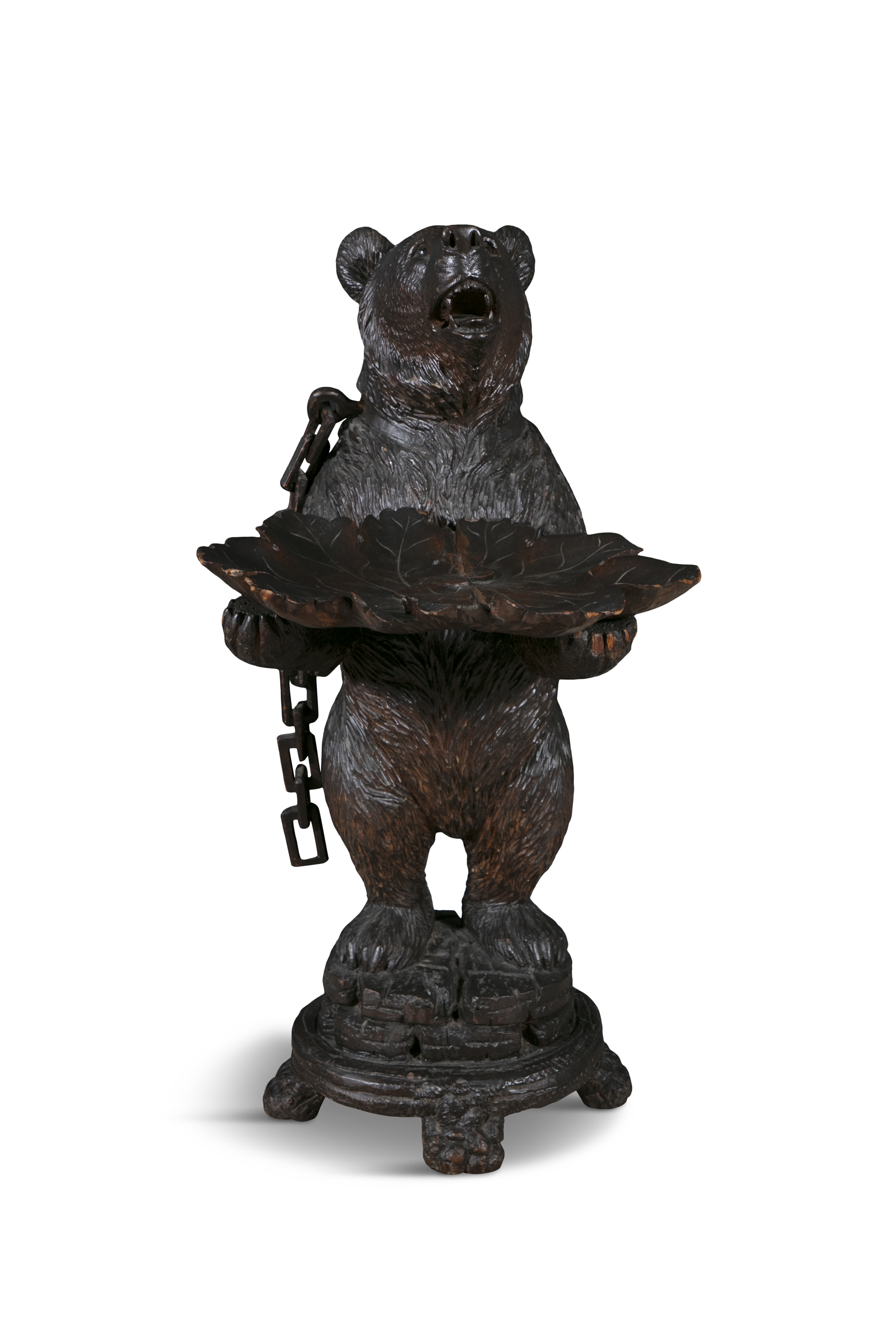 A SWISS 'BLACK FOREST' LINDEN WOOD BEAR, 19TH CENTURY modelled standing upright with