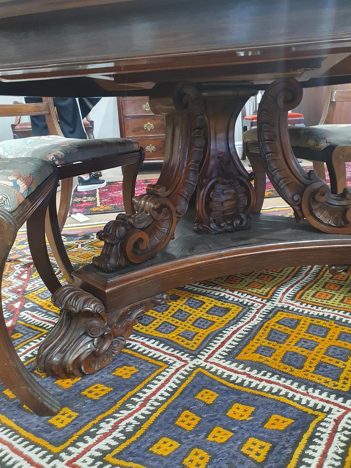 A VICTORIAN ROSEWOOD OCTAGONAL BREAKFAST TABLE, with stepped moulded rim, on carved scroll - Image 6 of 14