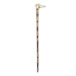 *A WOODEN WALKING CANE, with carved stag antler handle with an elephant head, gilt metal collar,