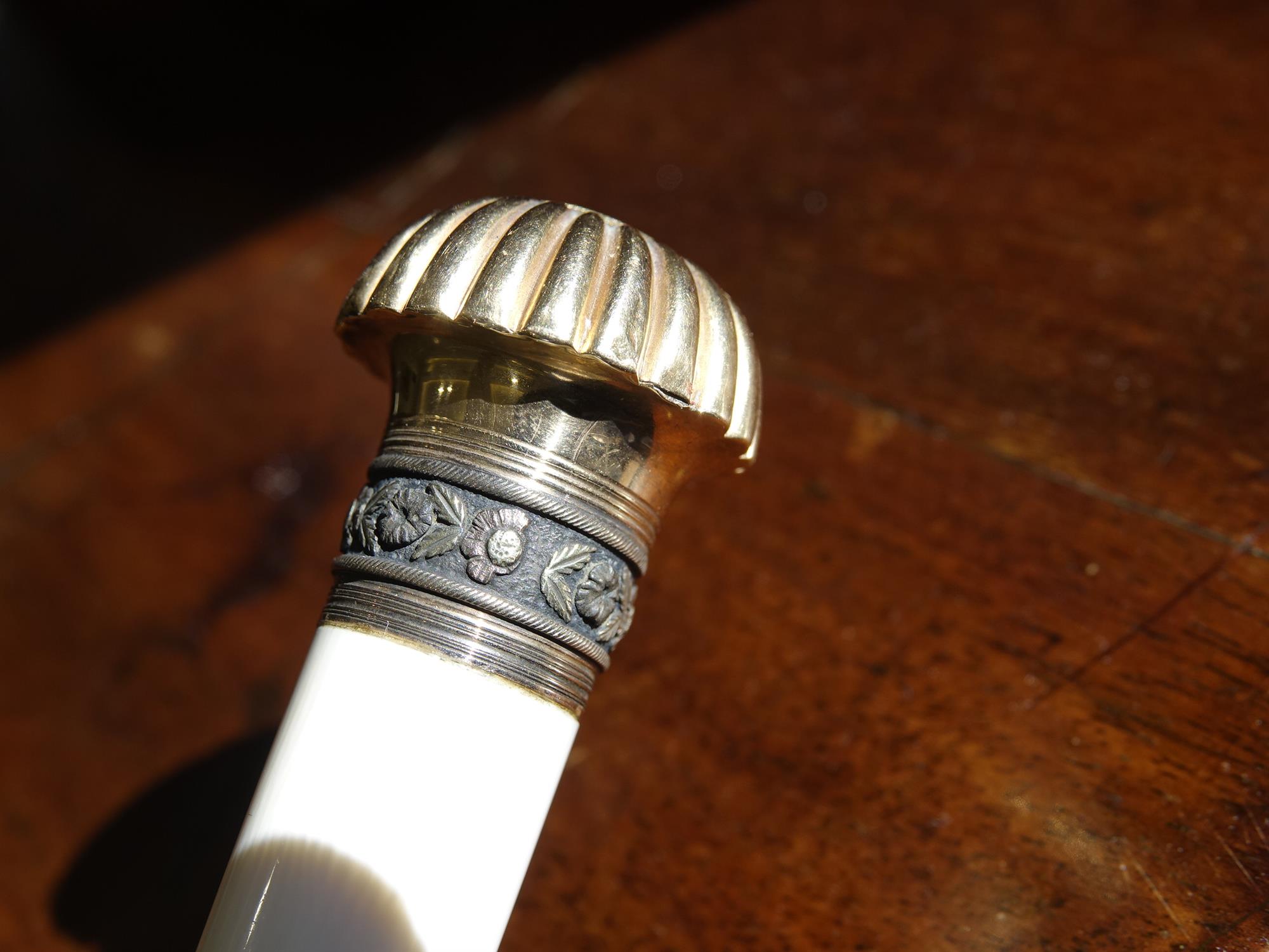 *A WALKING CANE, 19TH CENTURY with gilt metal top, inscribed with crest, with ivory and faux - Image 6 of 10