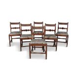 A SET OF SIX MAHOGANY DINING CHAIRS, EARLY 19TH CENTURY, each with the slightly scrolled back
