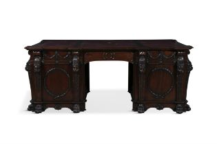 A MAHOGANY TWIN PEDESTAL PARTNER'S DESK, following a design of Thomas Chippendale of 1740,