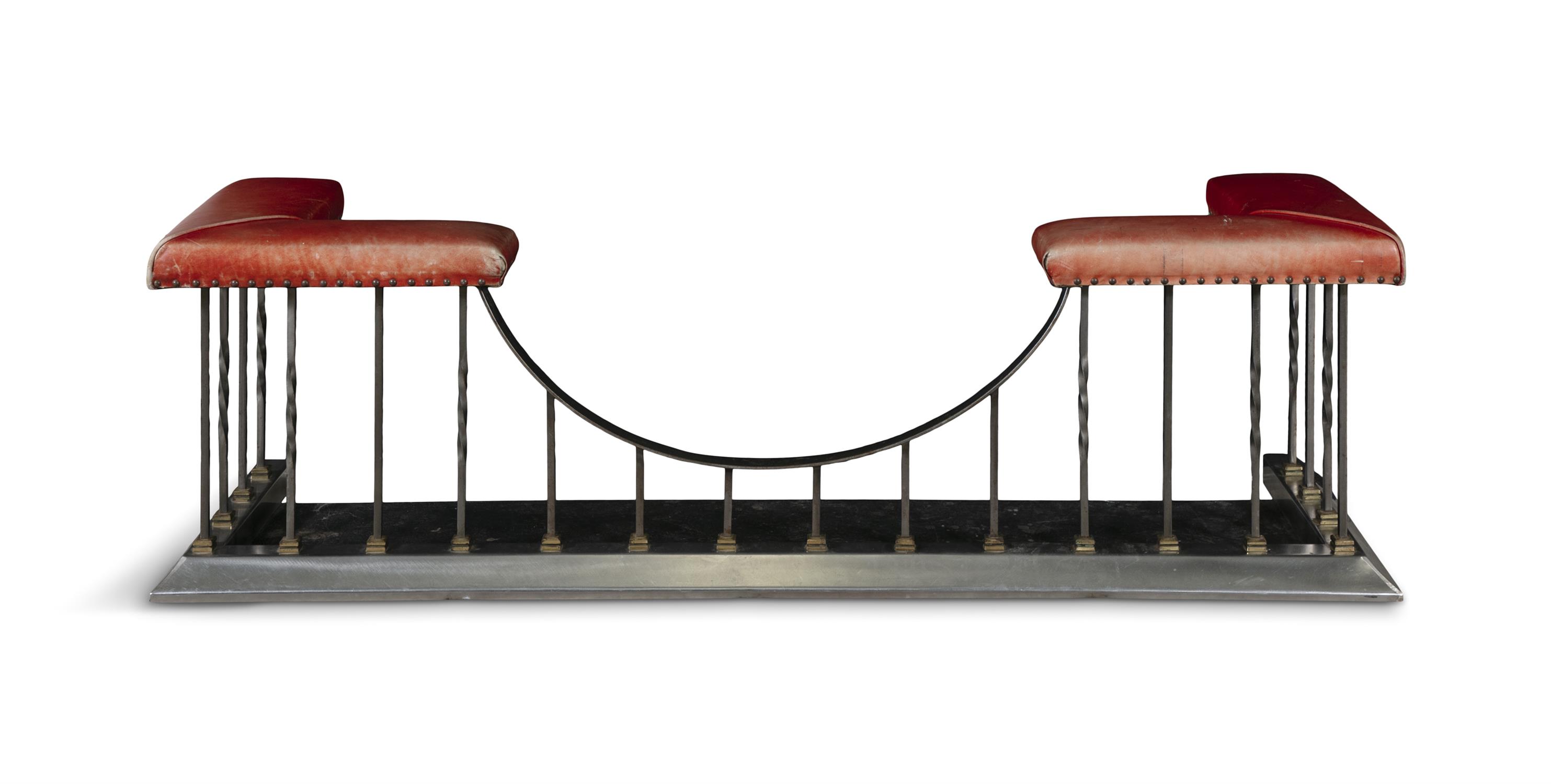 A 20TH CENTURY STEEL FRAME CLUB FENDER, with close nail padded seats, upholstered in red - Image 2 of 3