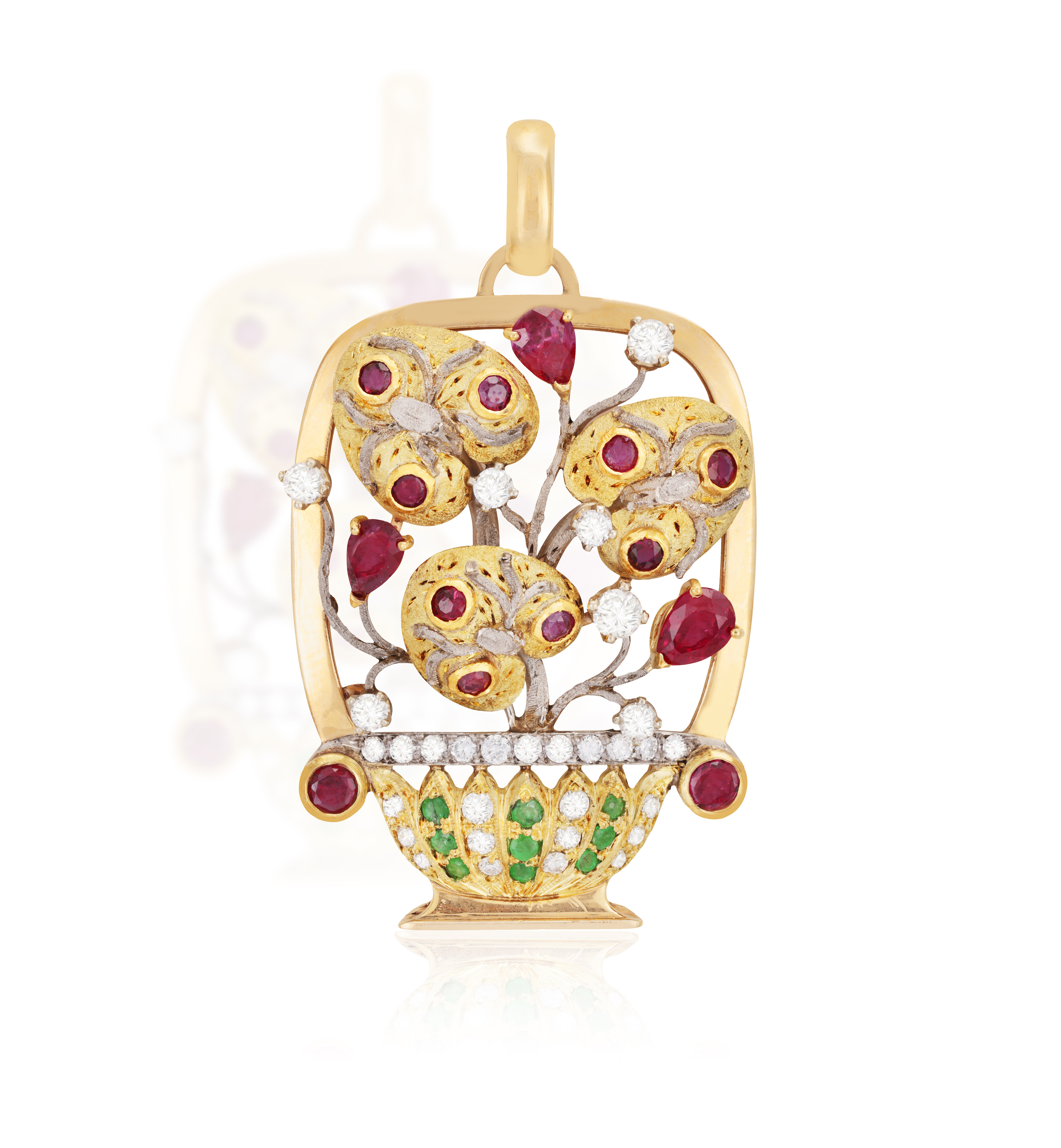 A GEM-SET 'GIARDINETTO' PENDANT Of openwork foliate design, set with pear and circular-cut rubies