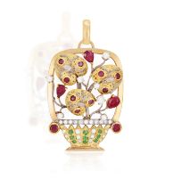 A GEM-SET 'GIARDINETTO' PENDANT Of openwork foliate design, set with pear and circular-cut rubies