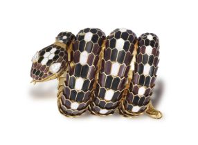 A RARE AND COLLECTIBLE 'SERPENTI' BRACELET WATCH, BY BULGARI, CIRCA 1960 Designed as a snake, the