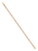 A DIAMOND LINE BRACELET Composed of a continuous line of brilliant-cut diamonds, mounted in 18K rose