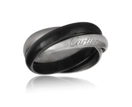 A TRINITY RING, BY CARTIER, CIRCA 2015 Designed as three interlocking bands, two polished white gold
