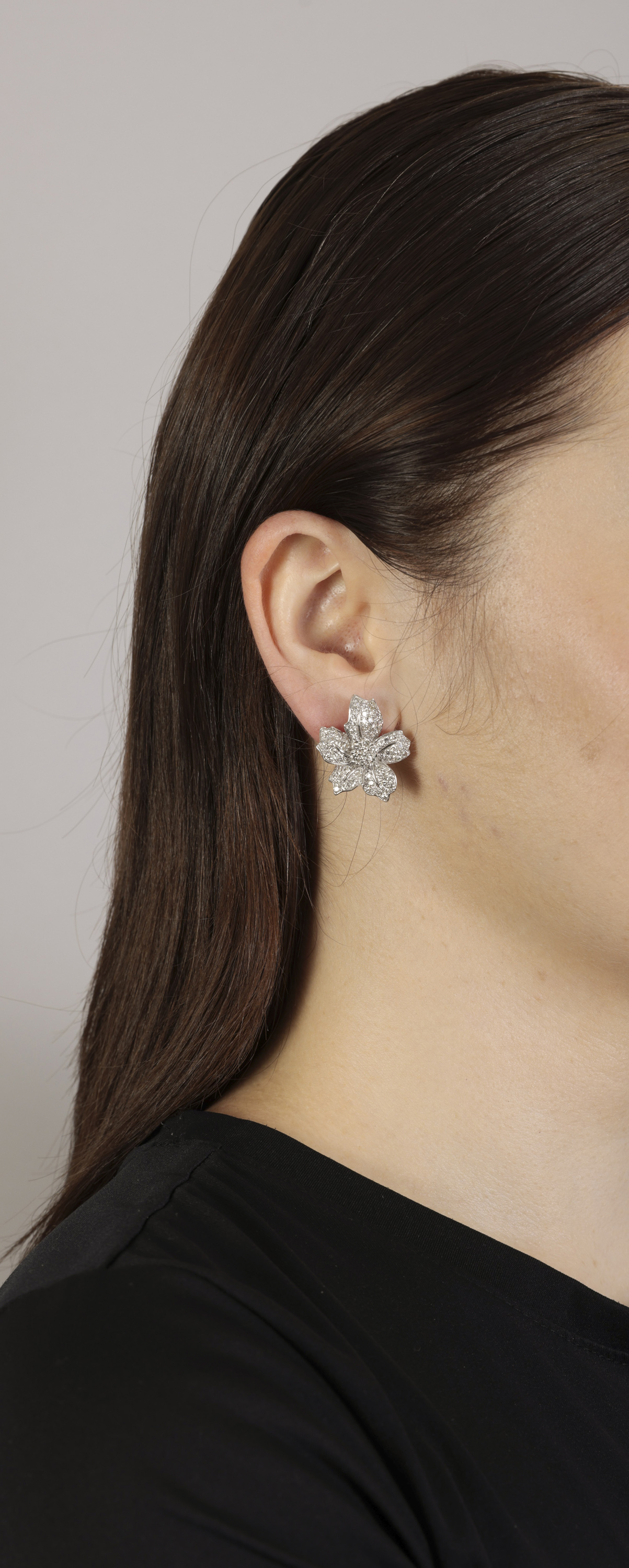 A PAIR OF DIAMOND EARRINGS Each flowerhead pavé-set with brilliant-cut diamonds, mounted in 18K - Image 2 of 3