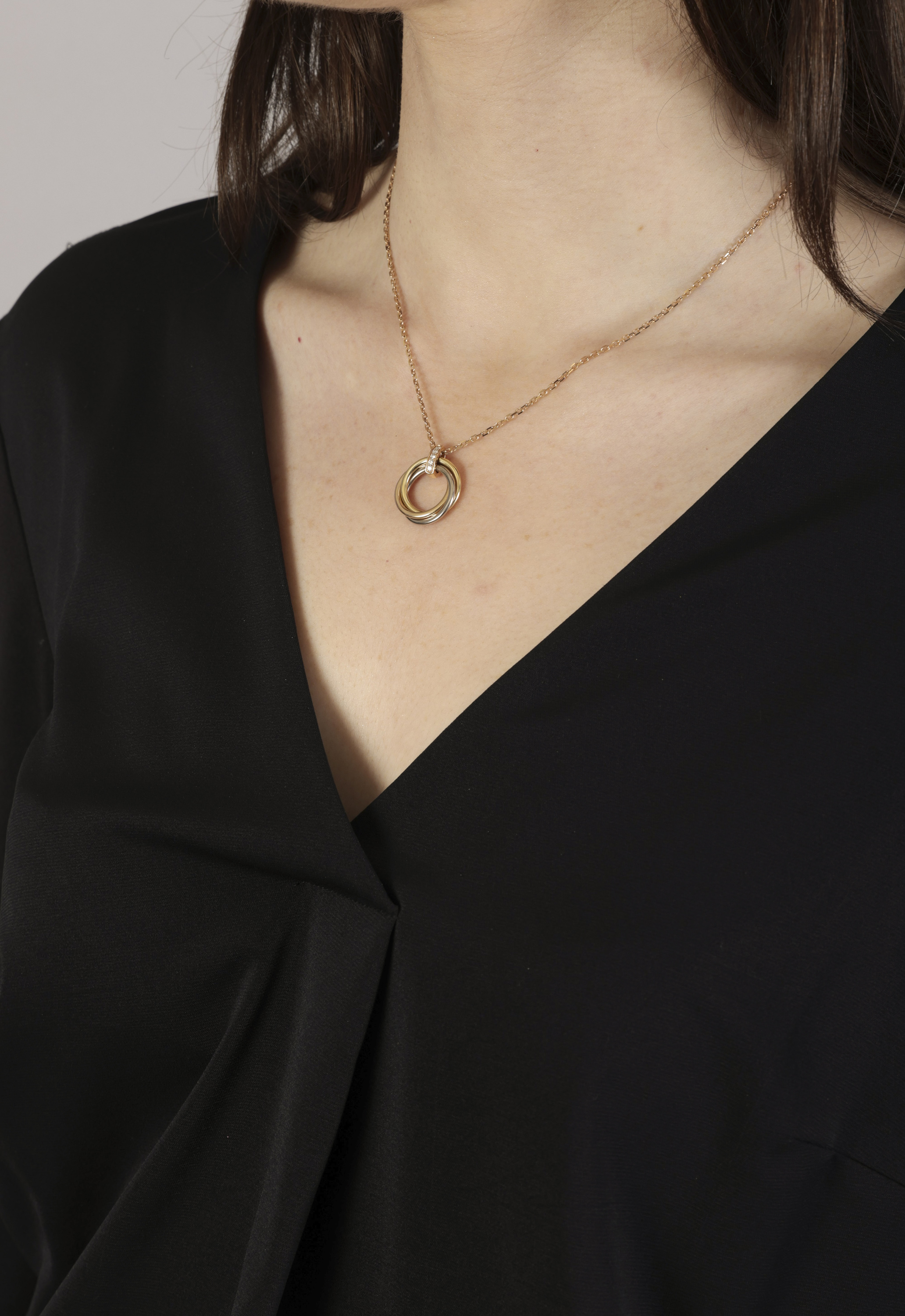 A DIAMOND TRINITY PENDANT ON CHAIN, BY CARTIER Composed of three interlocking tri-coloured gold - Image 4 of 4