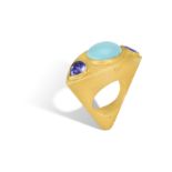 A TURQUOISE AND TANZANITE COCKTAIL RING, BY GEORG SPRENG, 2001 The oval-shaped 13.46ct turquoise