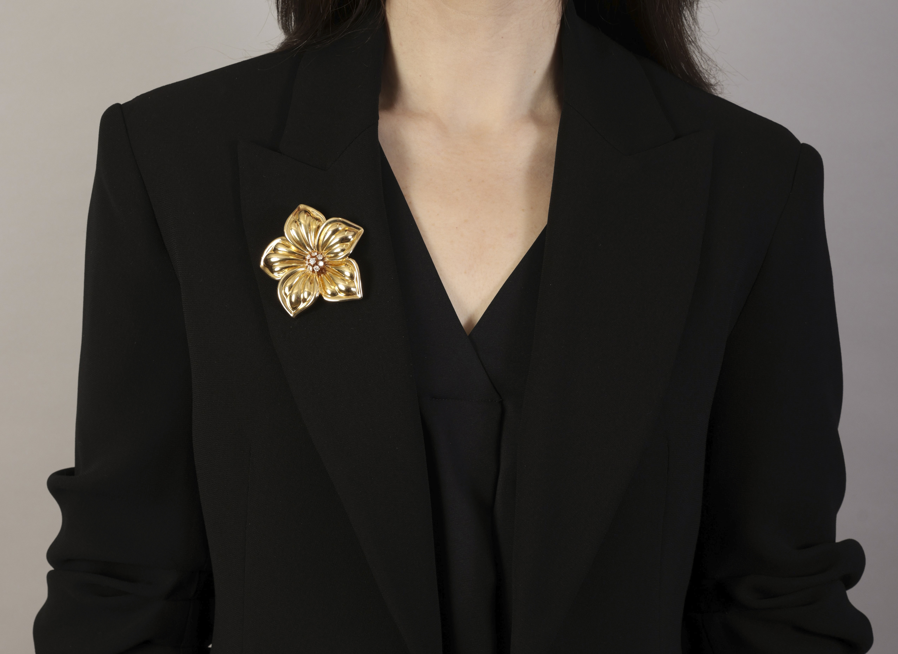A DIAMOND 'DIANA' BROOCH, BY VAN CLEEF & ARPELS, CIRCA 1990 Designed as a sculpted flowerhead, the - Image 3 of 5