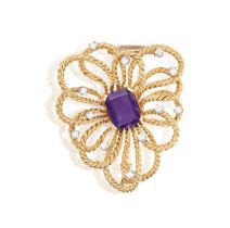 AN AMETHYST AND DIAMOND PENDANT/BROOCH, BY BOUCHERON, CIRCA 1965 The stylised ropetwist bow centring