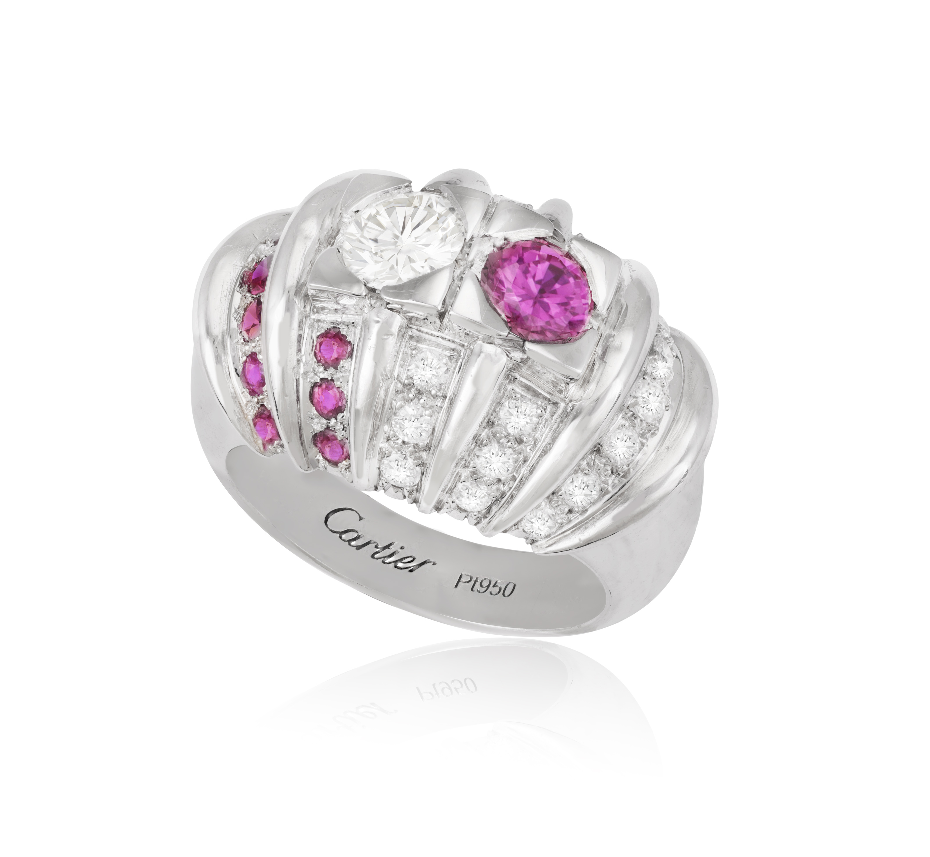 A RUBY AND DIAMOND DRESS RING, CARTIER Of domed fluted design, set with a brilliant-cut diamond