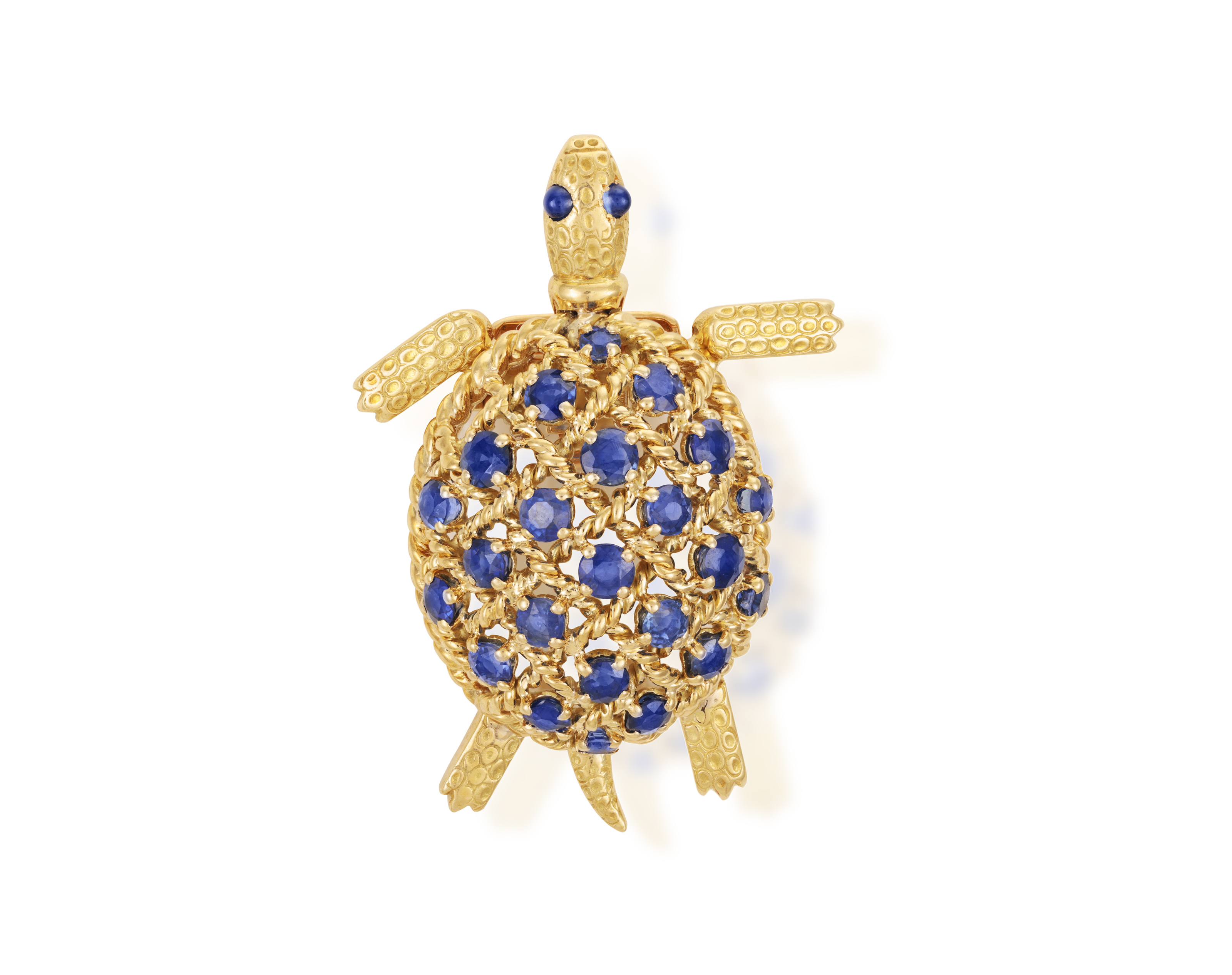 A SAPPHIRE NOVELTY BROOCH, BY CARTIER, CIRCA 1960 Designed as a turtle, the shell set with