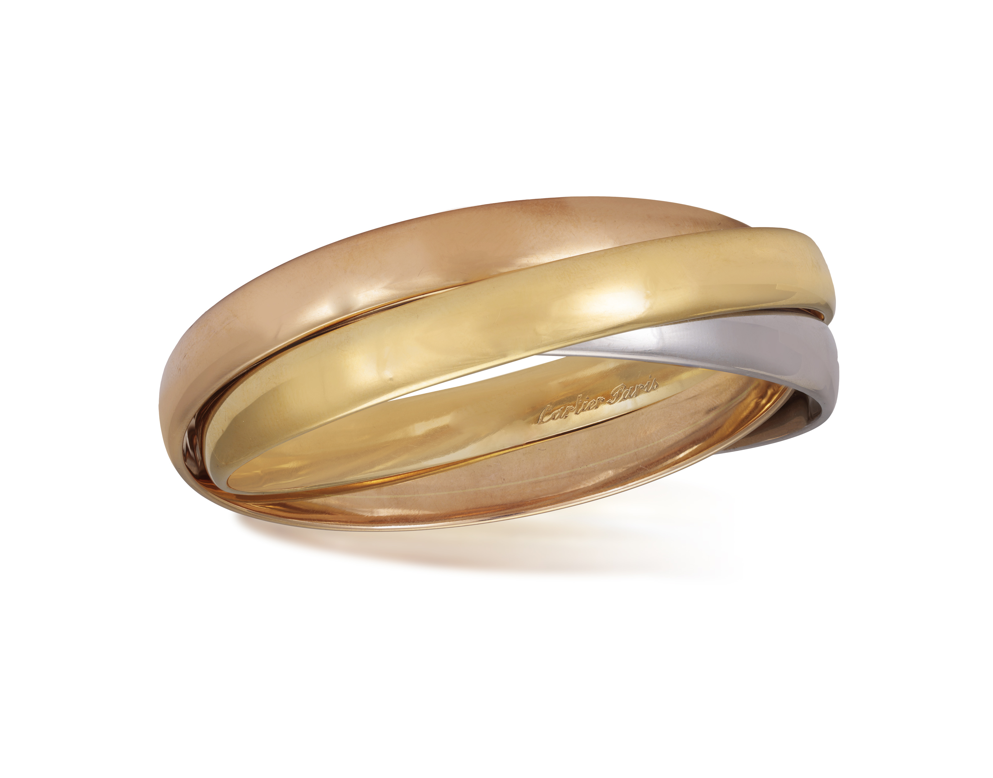 A GOLD 'TRINITY' BANGLE, BY CARTIER Composed of three interlocking polished 18K tri-coloured gold