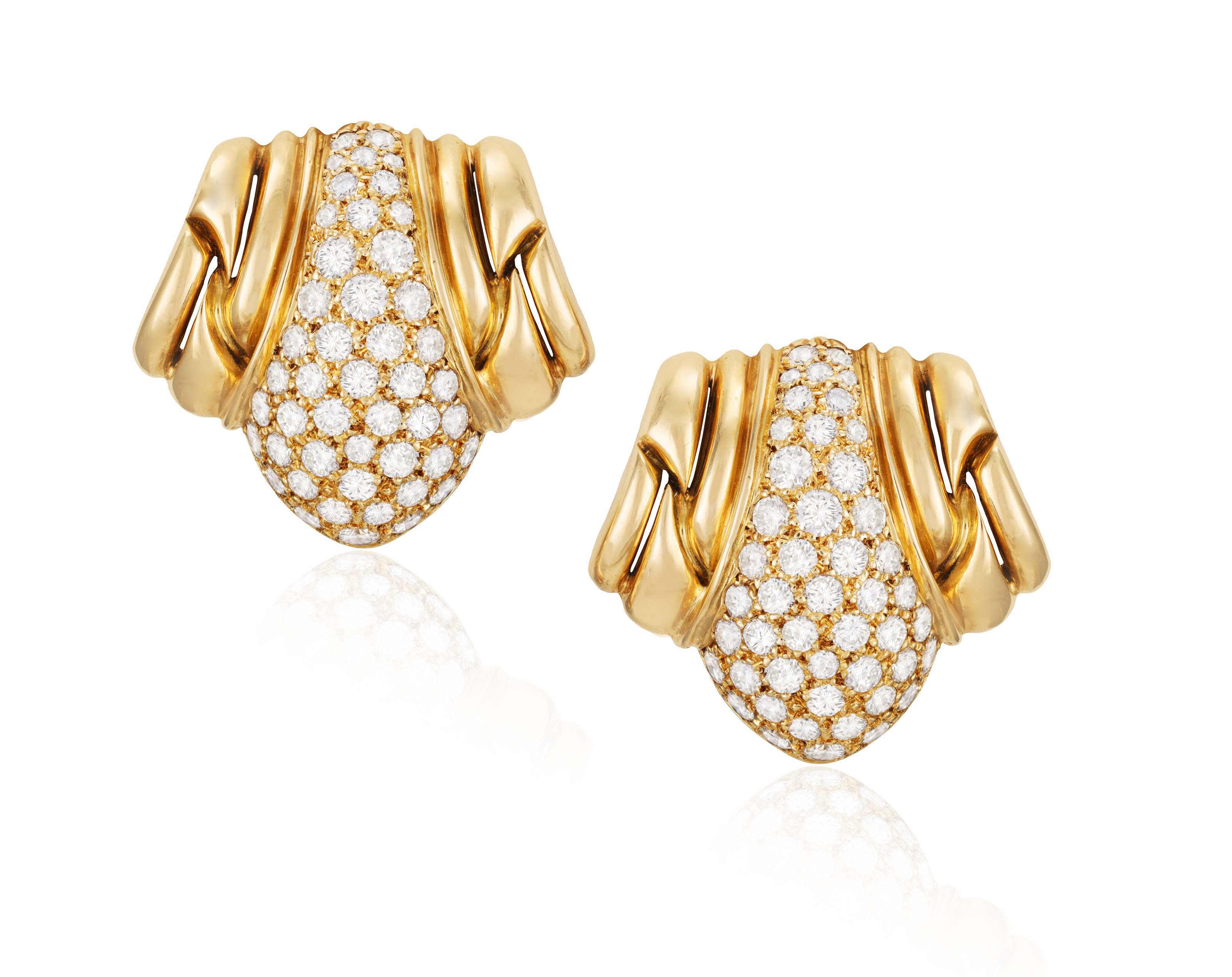 A PAIR OF DIAMOND EARCLIPS, BY BOUCHERON, CIRCA 1990 Of openwork bombé design, each pavé-set with