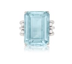 AN AQUAMARINE AND DIAMOND RING Set with a rectangular-cut aquamarine weighing approximately 30.