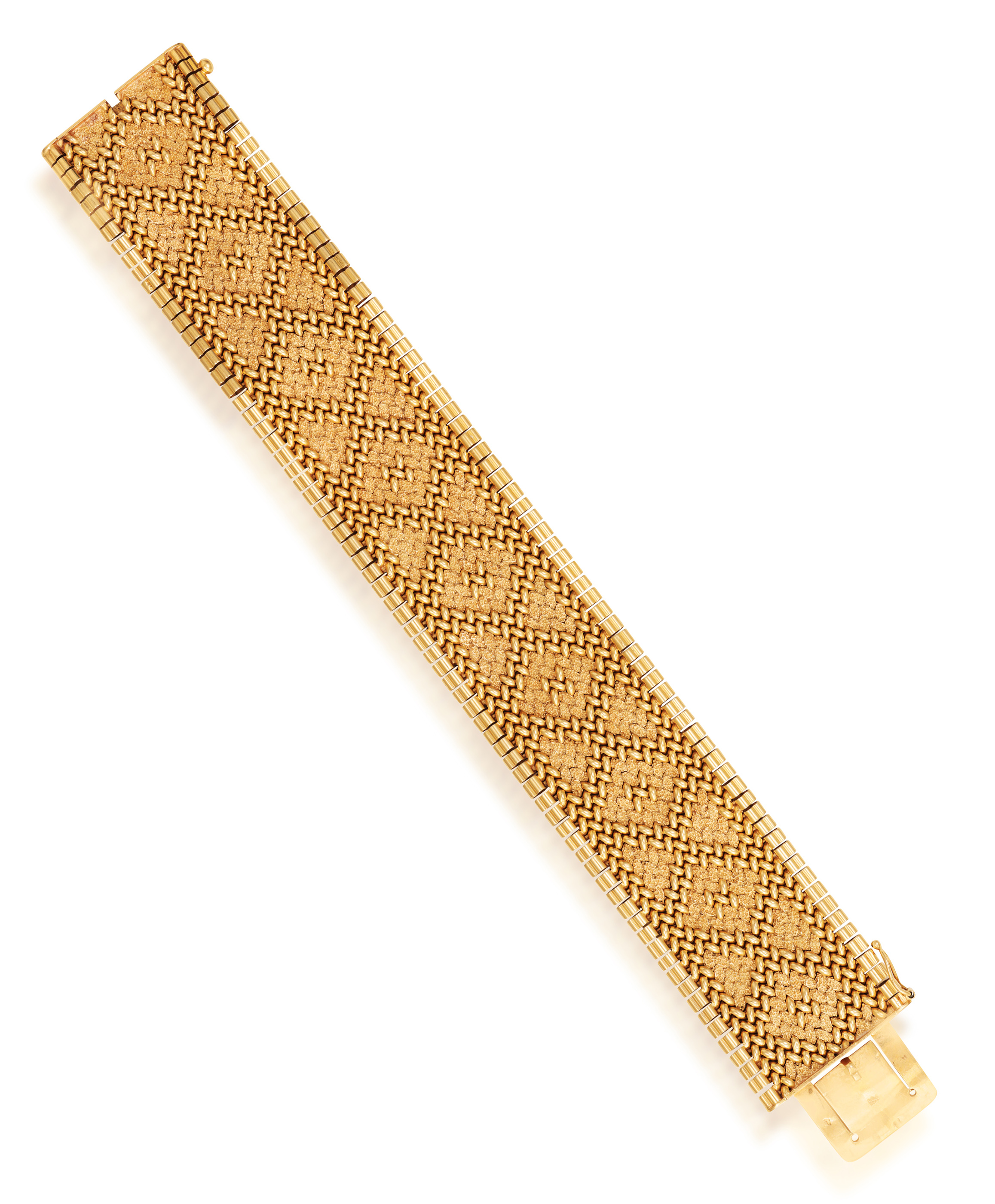 A GOLD BRACELET, FRENCH, CIRCA 1965 The textured and polished strap designed to resemble embroidery,