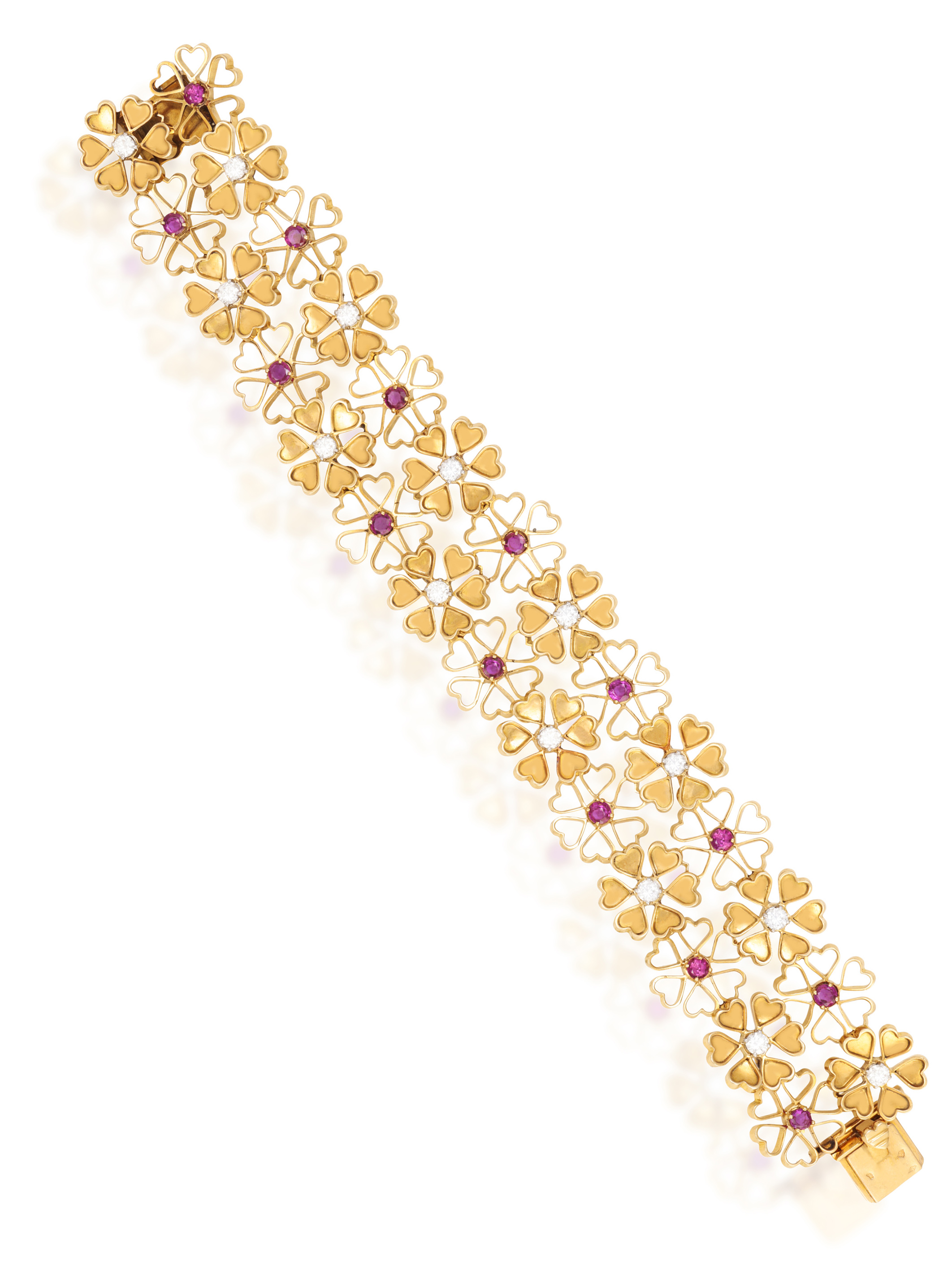A RUBY AND DIAMOND BRACELET, BY PÉRY & FILS Of openwork design, composed of flowerheads