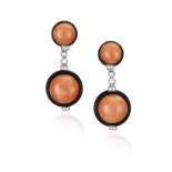 A PAIR OF CORAL, ONYX AND DIAMOND PENDENT EARRINGS Each circular-shaped coral cabochon within an