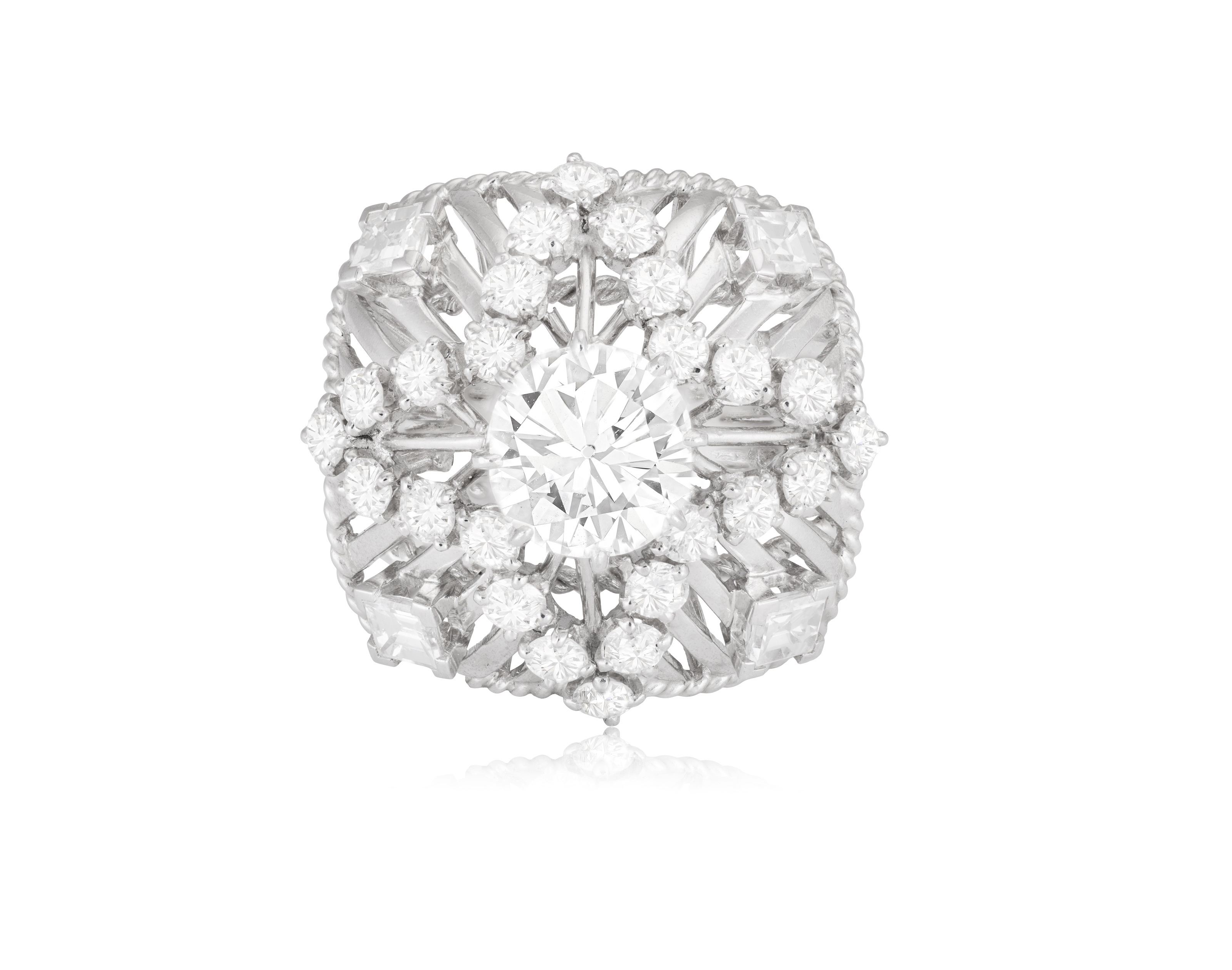 A DIAMOND DRESS RING, FRENCH, CIRCA 1960 Of openwork domed design, the central old brilliant-cut - Image 2 of 5