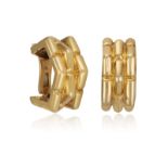 A PAIR OF GOLD EARCLIPS, BY PÉRY & FILS Each polished gold earclip with fluted detailing, mounted in