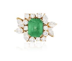 AN EMERALD AND DIAMOND DRESS RING The rectangular cut-cornered emerald weighing approximately 3.