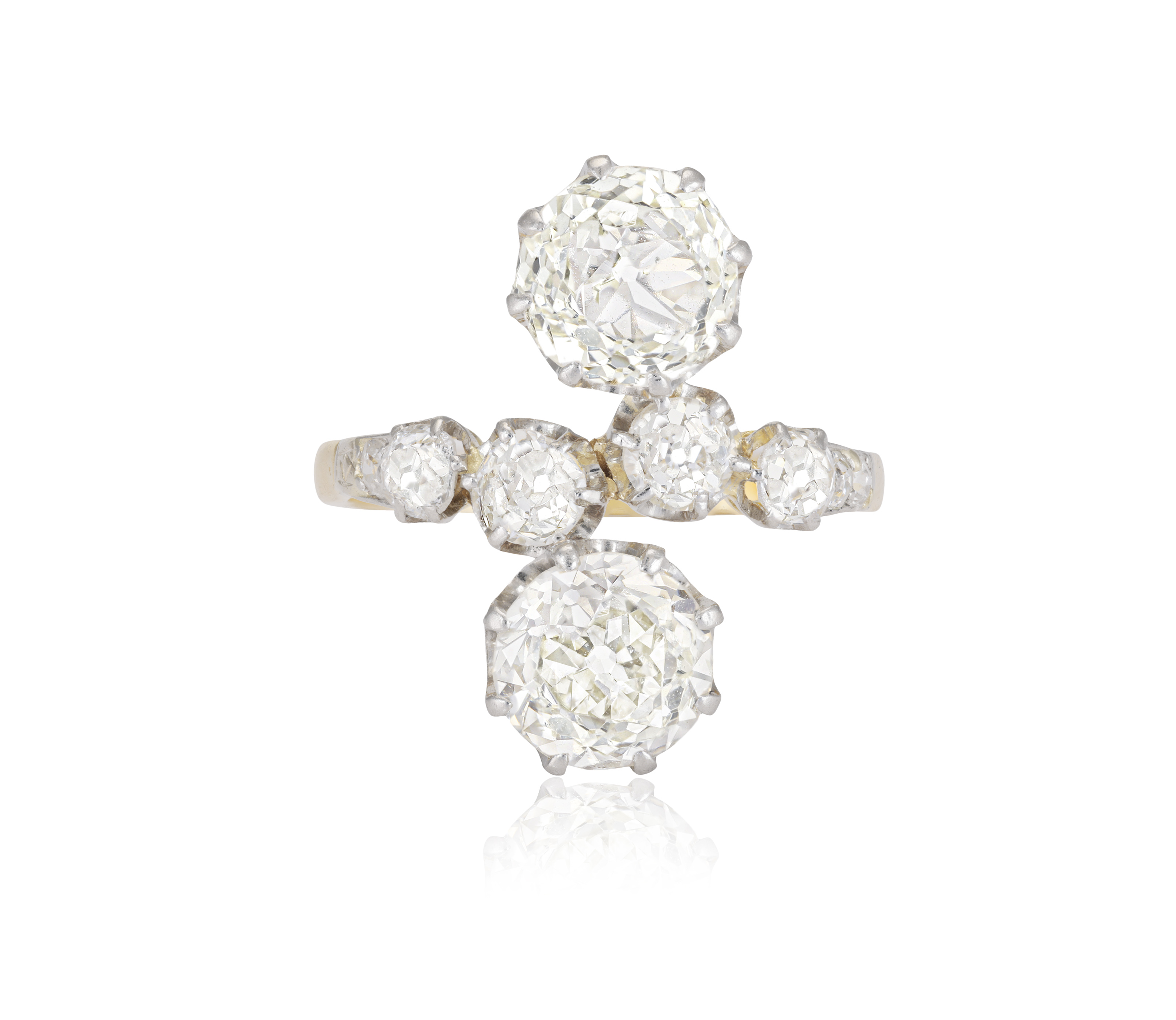 AN EARLY 20TH CENTURY 'TOI ET MOI' DIAMOND DRESS RING Composed of two old-cut diamonds weighing