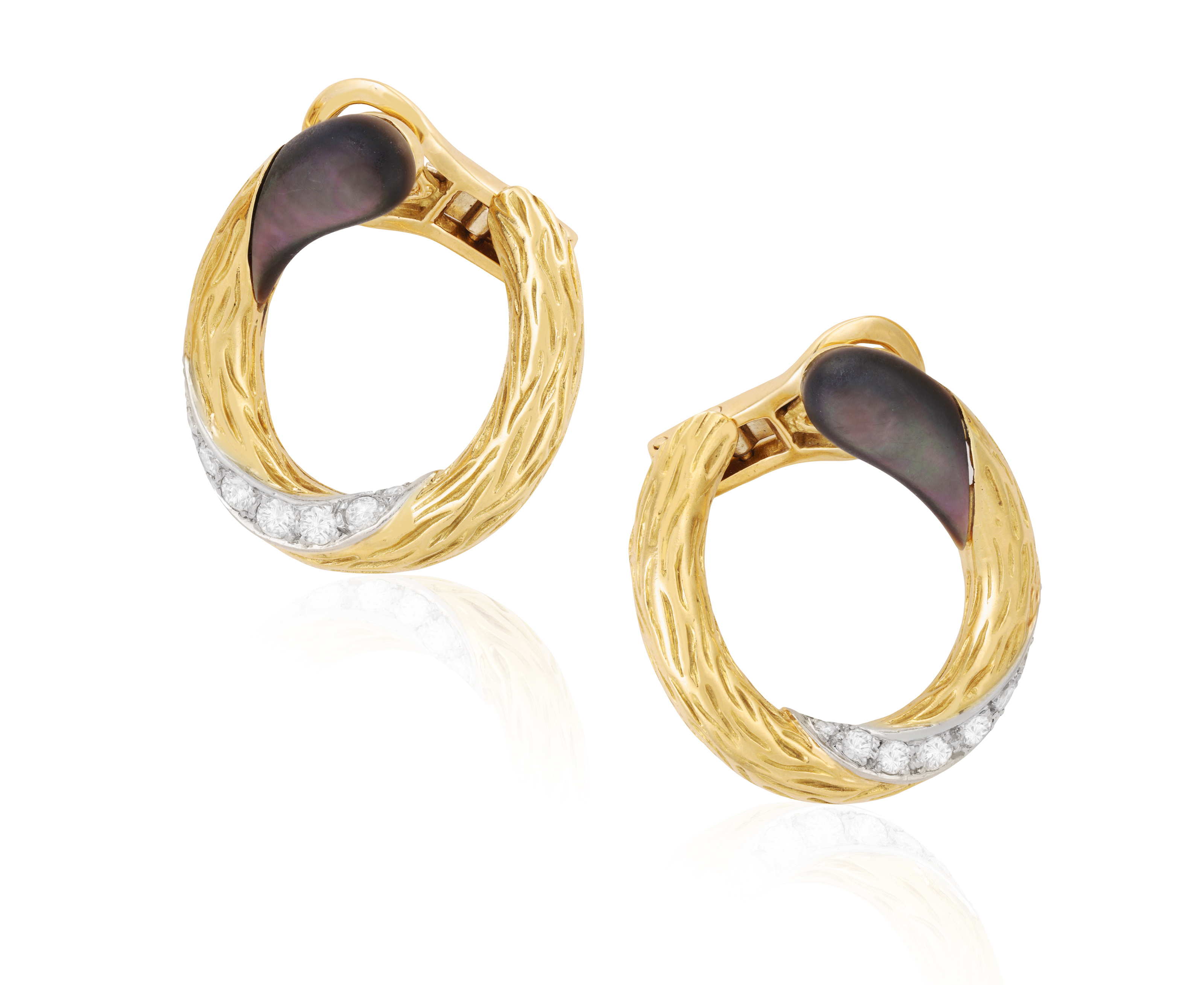 A PAIR OF DIAMOND AND MOTHER-OF-PEARL DIAMOND EARRINGS, BY MAUBOUSSIN, CIRCA 1970 Each textured gold
