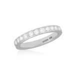 A DIAMOND ETERNITY RING, BY BOODLES Composed of a continuous row of brilliant-cut diamonds within