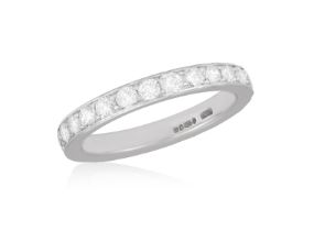 A DIAMOND ETERNITY RING, BY BOODLES Composed of a continuous row of brilliant-cut diamonds within