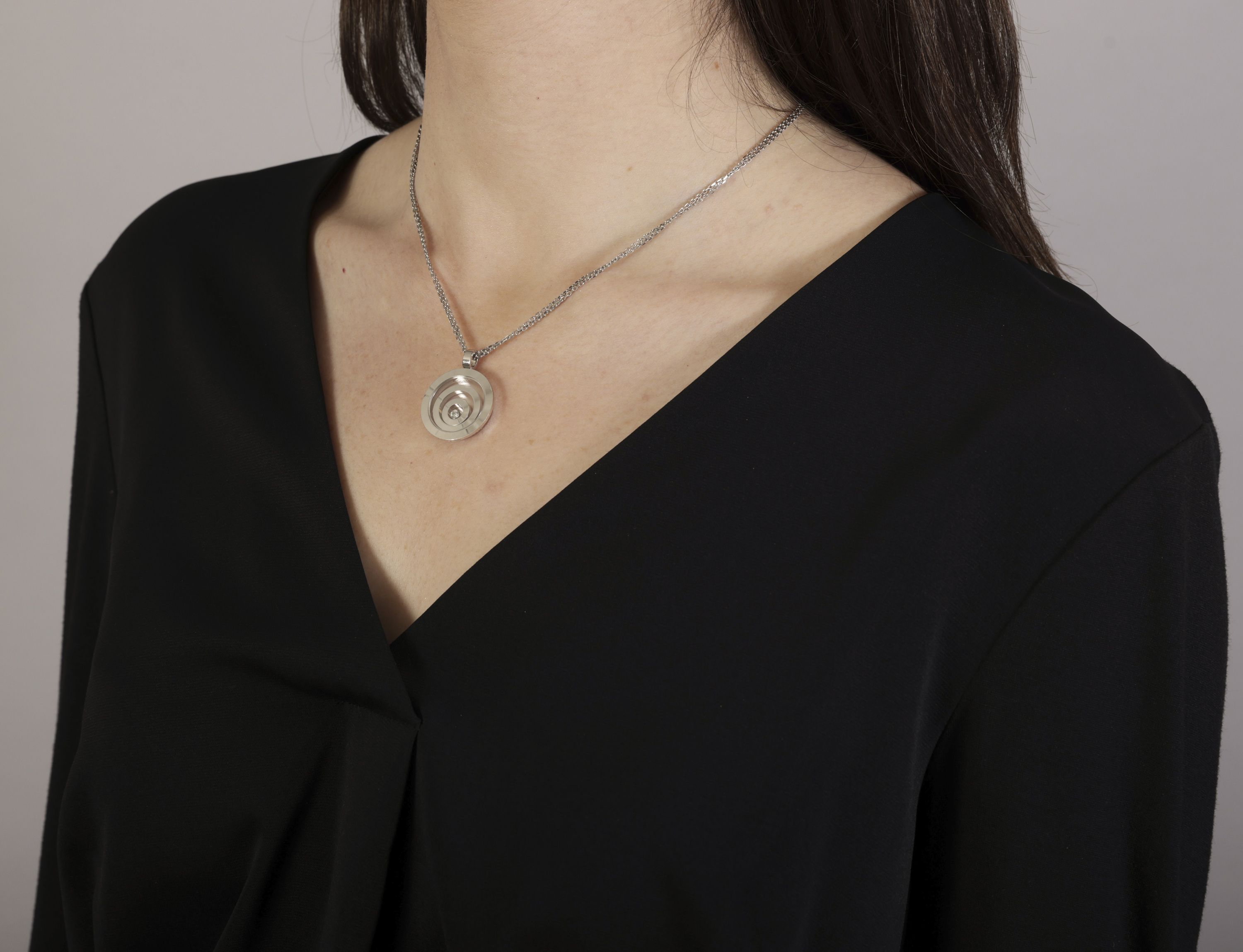 A DIAMOND 'HAPPY SPIRIT' PENDANT ON CHAIN, BY CHOPARD The circular glazed pendant enclosing two - Image 3 of 3
