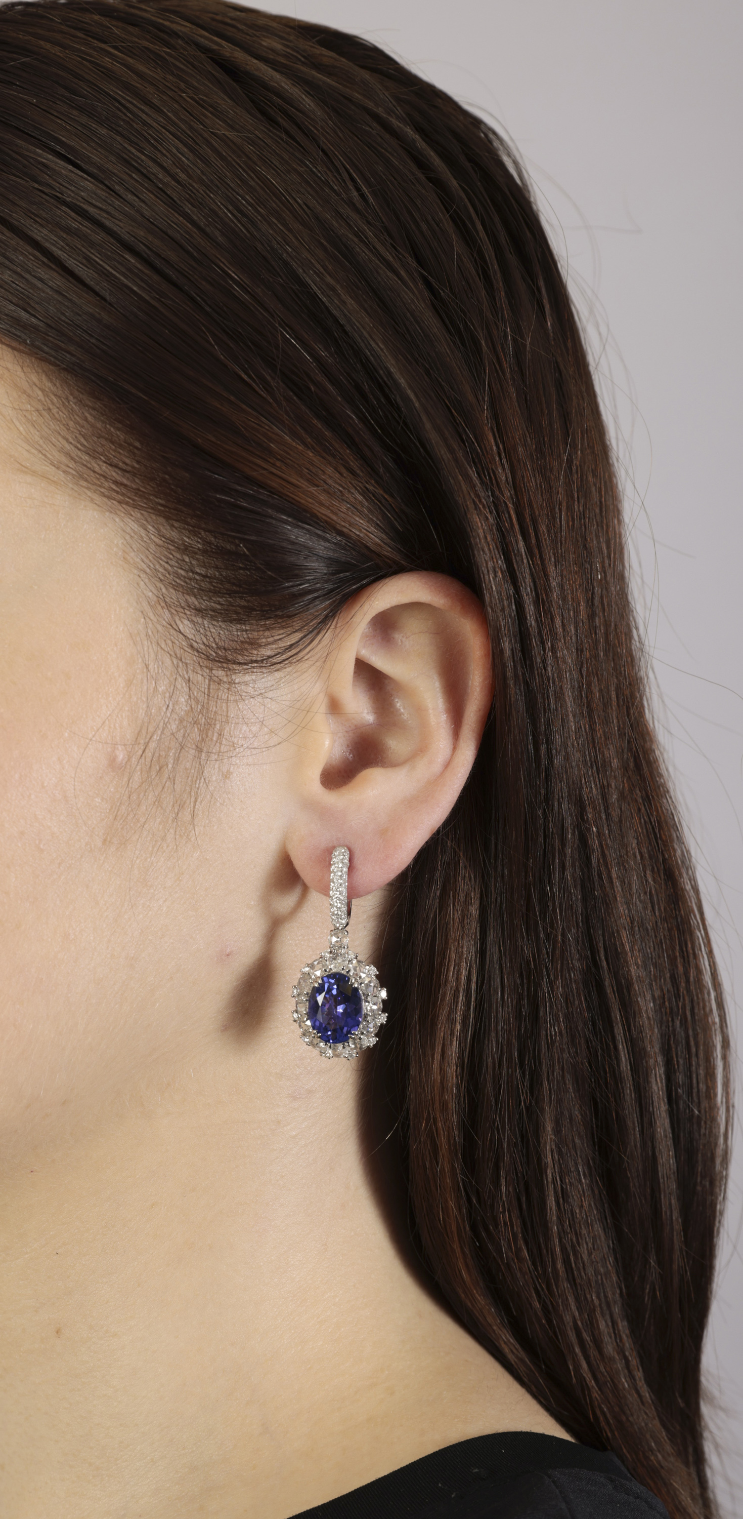 A PAIR OF TANZANITE AND DIAMOND PENDENT EARRINGS Each oval-shaped tanzanite weighing approximately - Image 2 of 3