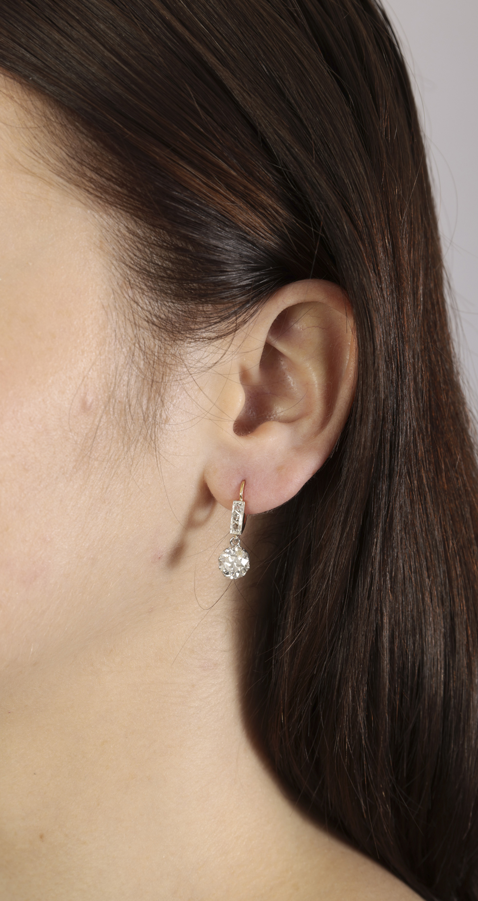 A PAIR OF EARLY 20TH CENTURY DIAMOND PENDENT EARRINGS Each set with an old European-cut diamond, - Image 3 of 3