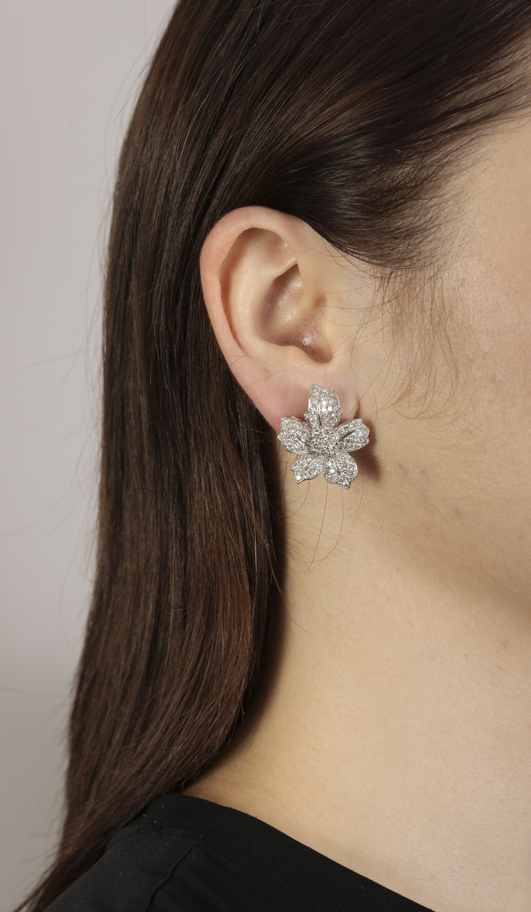 A PAIR OF DIAMOND EARRINGS Each flowerhead pavé-set with brilliant-cut diamonds, mounted in 18K - Image 3 of 3