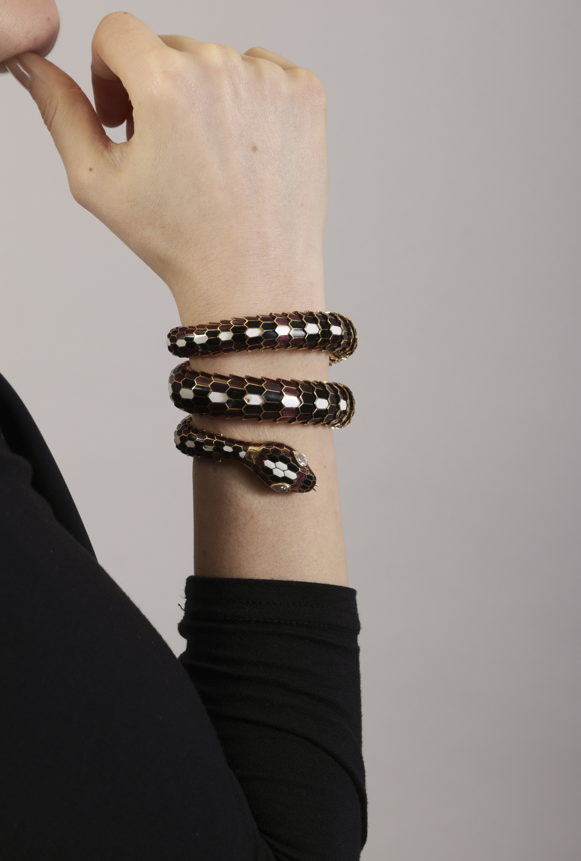A RARE AND COLLECTIBLE 'SERPENTI' BRACELET WATCH, BY BULGARI, CIRCA 1960 Designed as a snake, the - Image 13 of 14